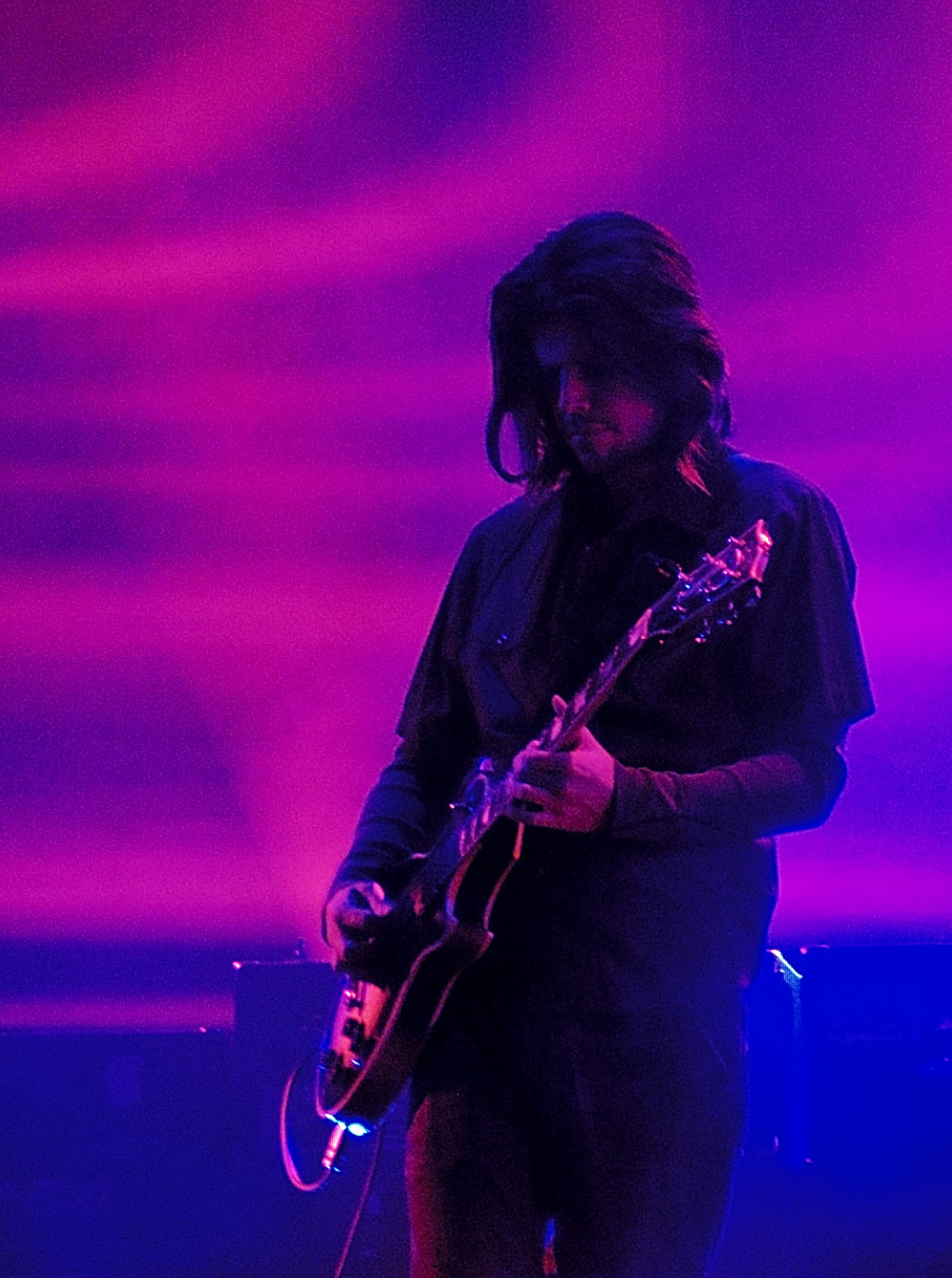 Adam Jones playing guitar live with Tool