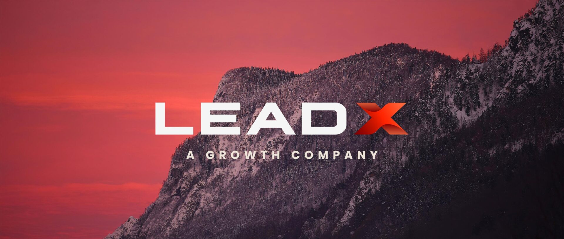 LEADX logo featured against a bold red mountain backdrop with the slogan 