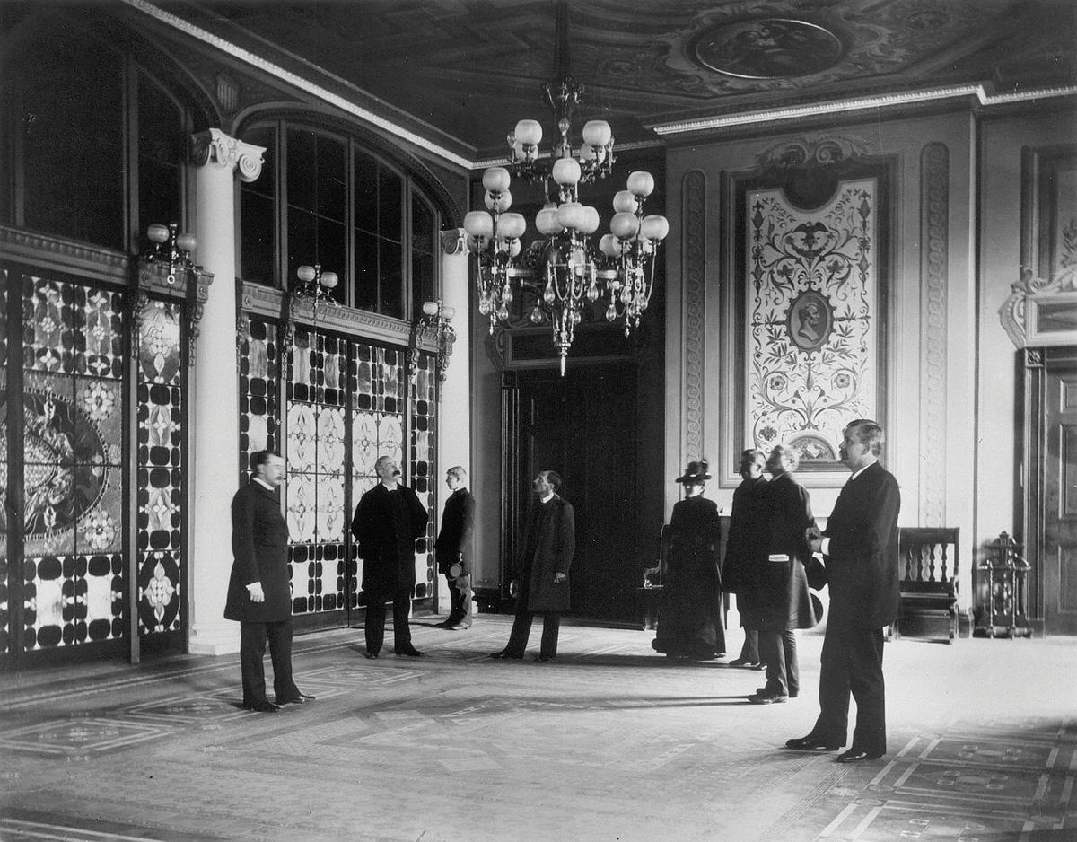 President Chester Arthur’s White House Entrance Hall featuring Louis Comfort Tiffany’s ornate glass screen 